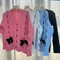 Damen Strickjacke mit dekorativen Taschen und Wellenmuster WW