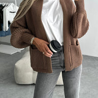Damen Strickjacke mit strukturierter Oberfläche und voluminösen Ärmeln WW