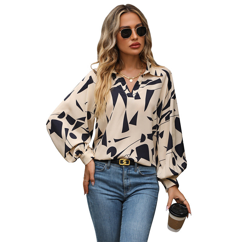 Damen Bluse mit auffälligem grafischem Design und voluminösen Ärmeln WW
