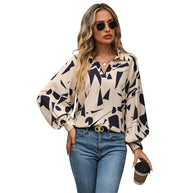Damen Bluse mit auffälligem grafischem Design und voluminösen Ärmeln WW