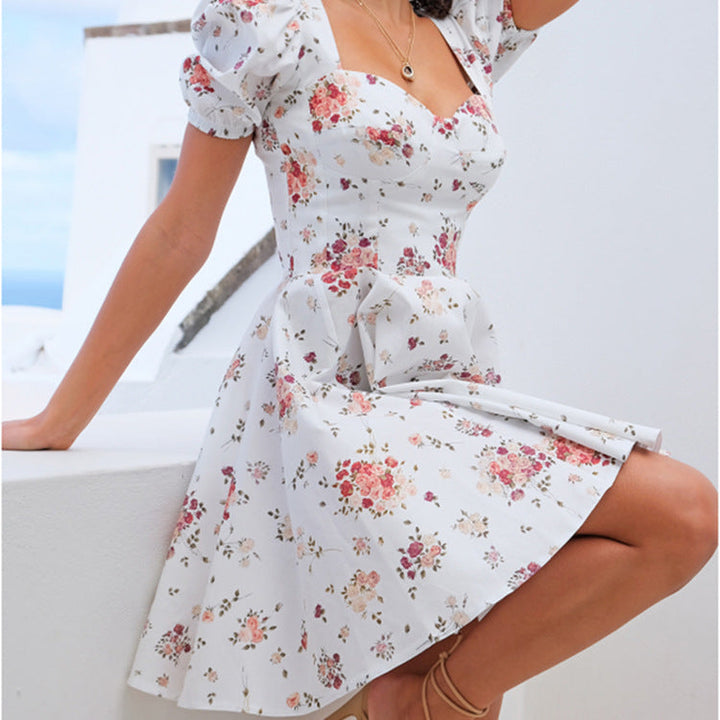 Damen Kleid mit Puffärmeln und floralem Design W&W Mode