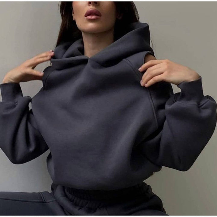 Damen Sweatshirt mit lässigem Cut-Out-Design und praktischen Taschen W&W Mode