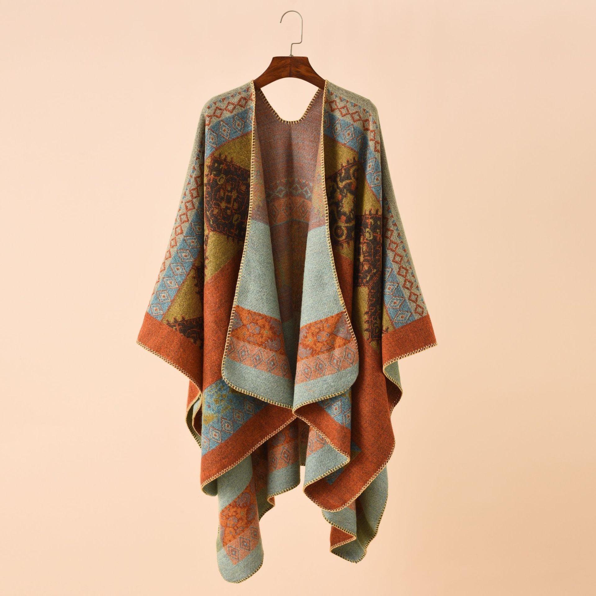Damen Modischer Poncho mit kunstvollem Muster und fransigen Kanten WW