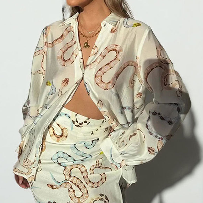 Damen Midikleid mit schickem Schlangenmuster und transparenten Ärmeln W&W Mode
