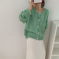 Damen Strickjacke mit bunten Knopfdetails und weich fließendem Design WW