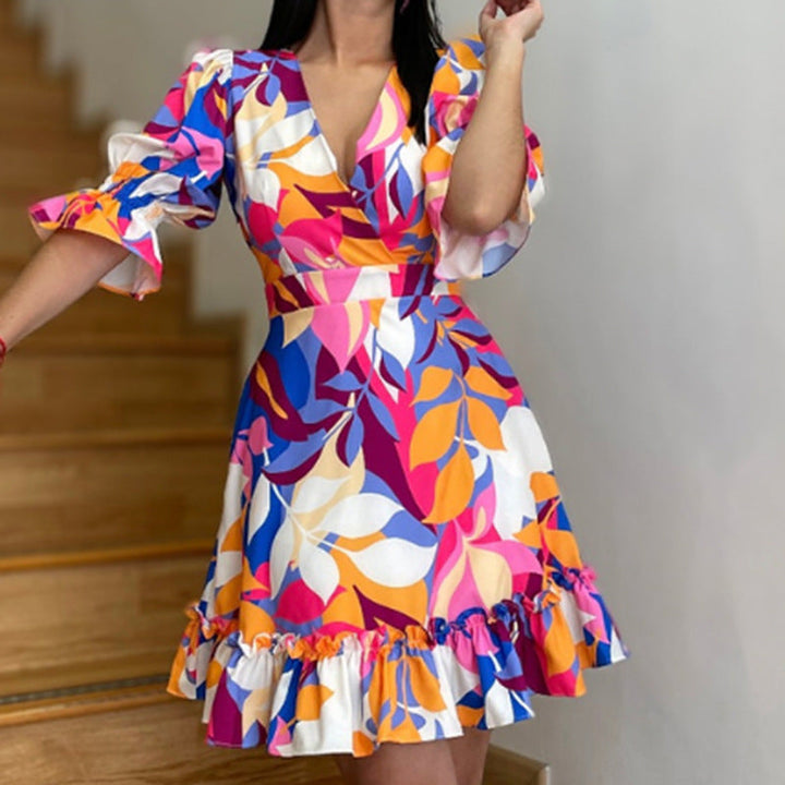 Damen Sommerkleid mit voluminösen Puffärmeln und fröhlichem Rüschen-Saum W&W Mode