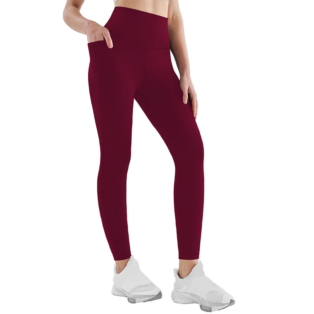 Damen Athletische Stretch-Leggings mit hoher Taille und seitlichen Taschen WW