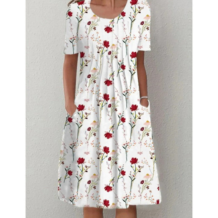 Damen Freizeitkleid mit verspieltem Blumendruck und praktischen Taschen W&W Mode