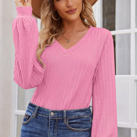 Damen Strickbluse mit feiner Rippstruktur und lässigem V-Ausschnitt WW