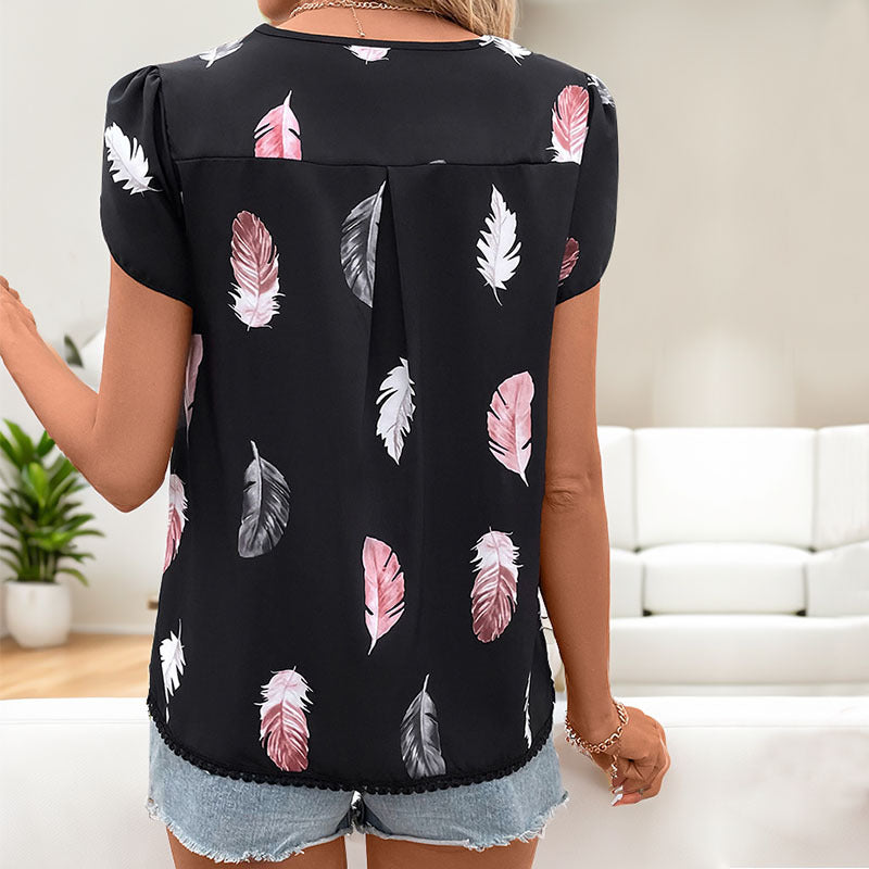 Damen Bluse mit romantischen Federmuster und Puffärmeln WW