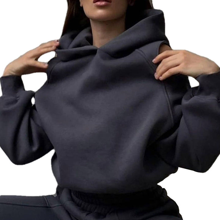 Damen Sweatshirt mit lässigem Cut-Out-Design und praktischen Taschen W&W Mode