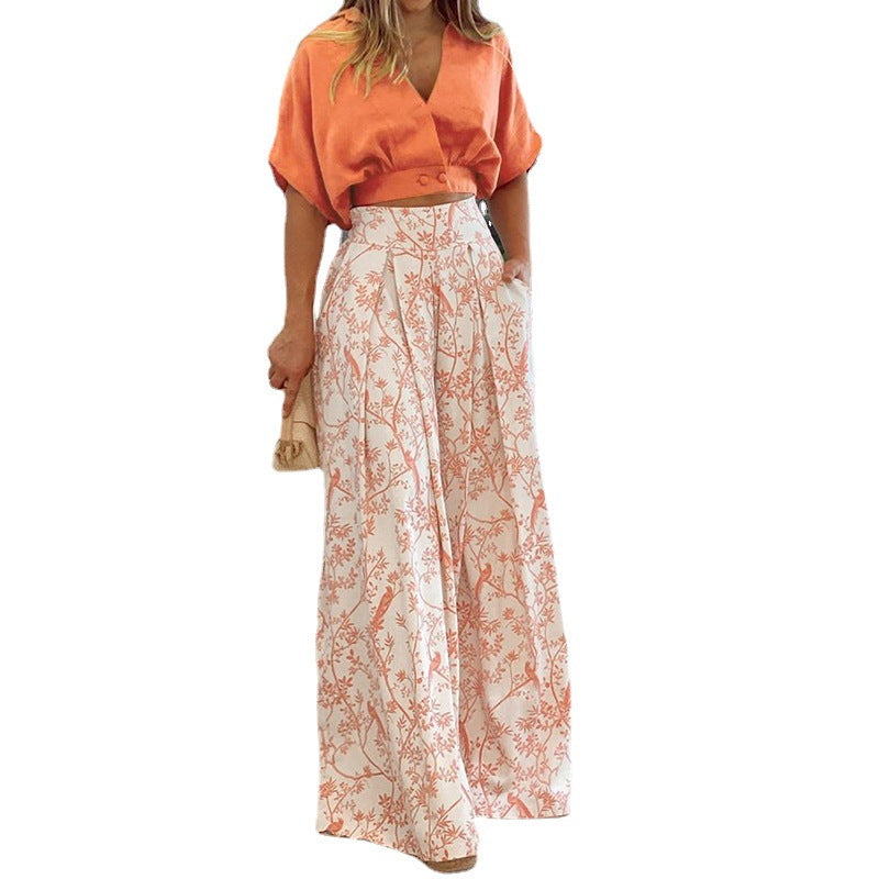 Damen Crop-Top Kombi-Anzug mit weitem Rock und floralem Muster W&W Mode