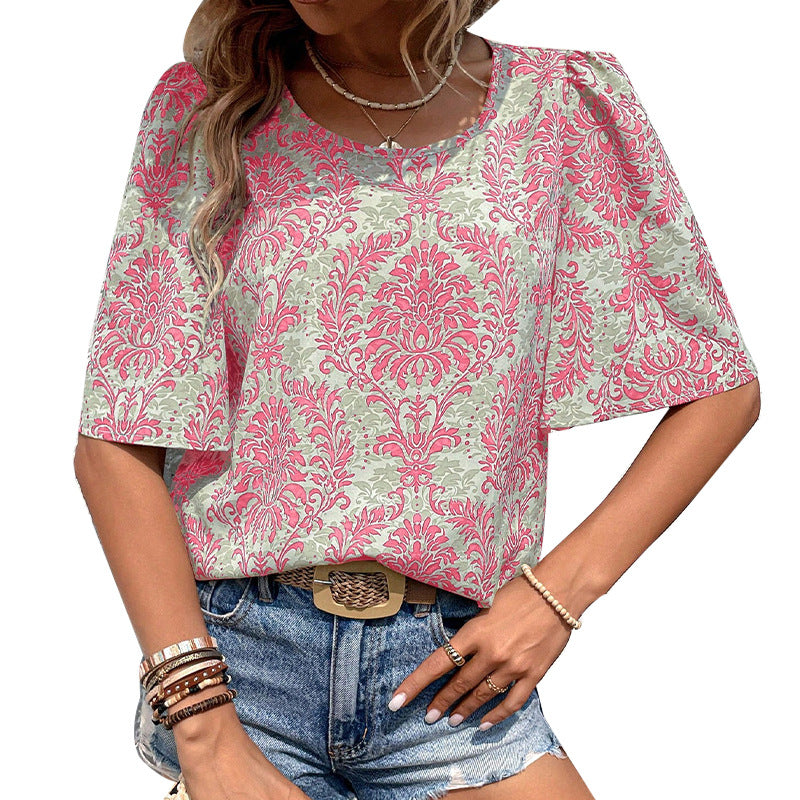 Damen Bluse mit volumetrischen Ärmeln und floralen Mustern WW