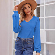 Damen Strickbluse mit feiner Rippstruktur und lässigem V-Ausschnitt WW