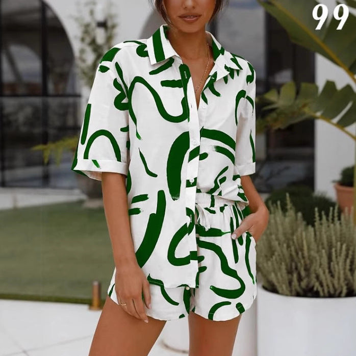 Damen Kurzarm-Jumpsuit mit grafischem Muster und tailliertem Schnitt WW