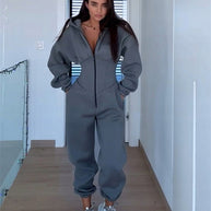 Damen Sportlicher Fleece-Jumpsuit mit hohem Kragen und trendiger Silhouette WW