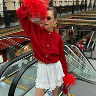 Damen Schicke Strickjacke mit auffälligen Federärmeln WW