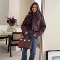 Damen Statement-Lederjacke mit asymmetrischem Schnitt und voluminösen Ärmeln WW