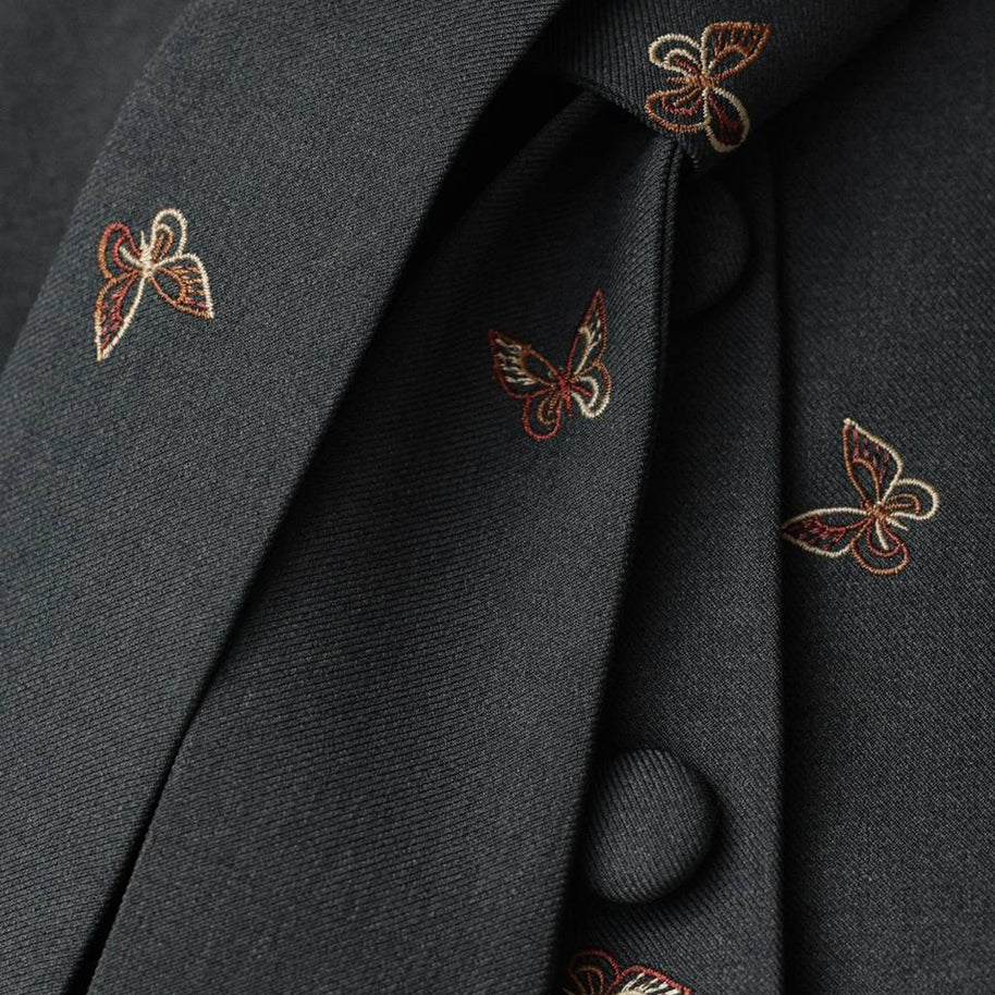 Damen Schößchenanzug mit ausgefallenen Puffärmeln und dekorativen Knöpfen WW