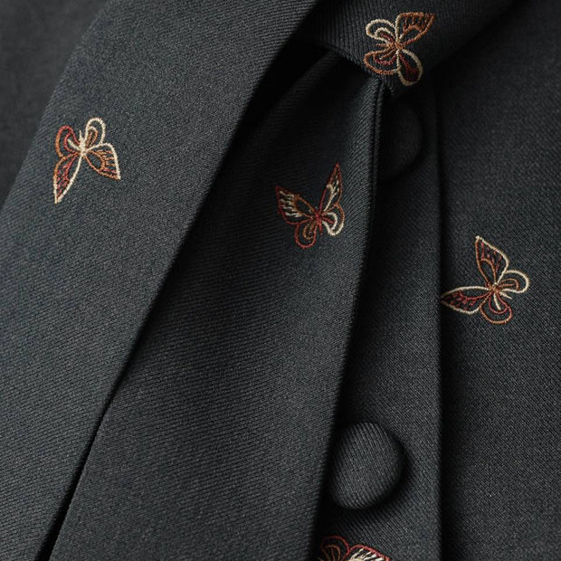 Damen Schößchenanzug mit ausgefallenen Puffärmeln und dekorativen Knöpfen WW