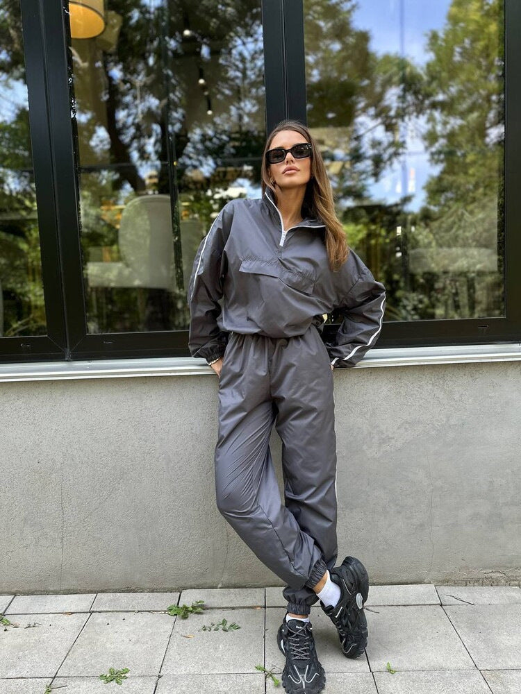 Damen sportlicher Funktionsanzug mit Stehkragen und elastischen Bündchen WW