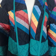 Damen Steppjacke mit buntem geometrischen Muster WW