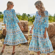 WW | Damen Midikleid mit V-Ausschnitt und Blumenmuster