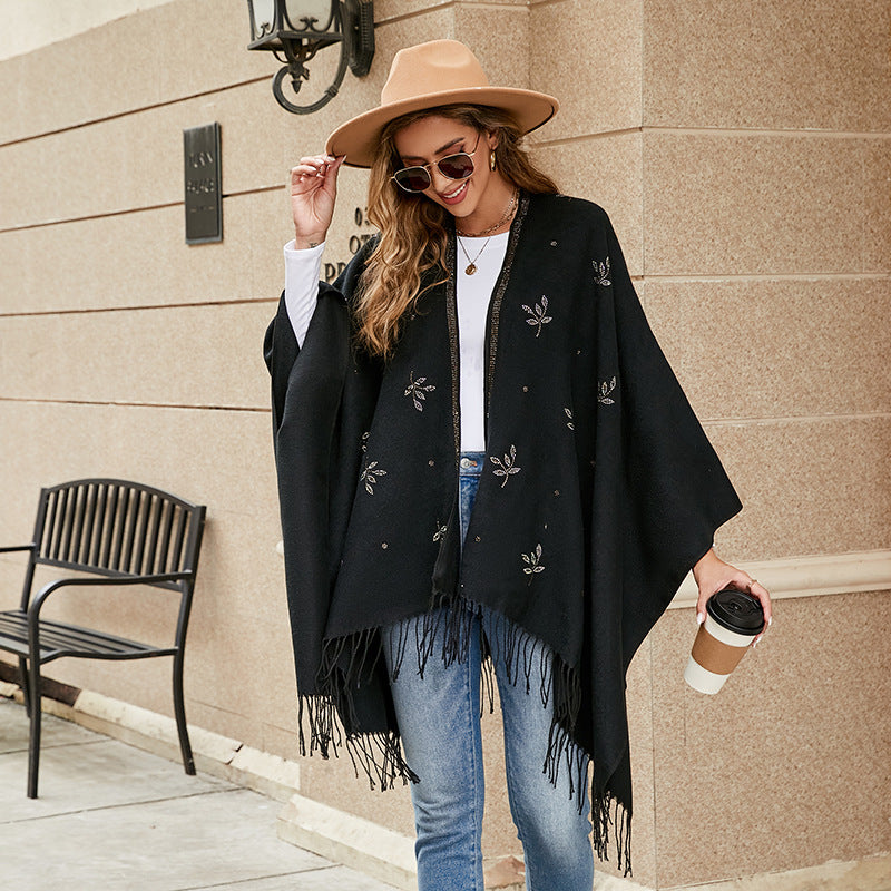 Damen Eleganter Poncho mit floralem Stickmuster und fransigen Kanten WW