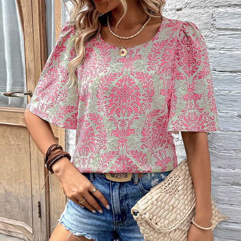 Damen Bluse mit volumetrischen Ärmeln und floralen Mustern WW
