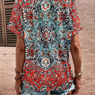 Damen Kurzarm Bluse mit dekorativem Musterdruck und knöpfbarem Ausschnitt WW