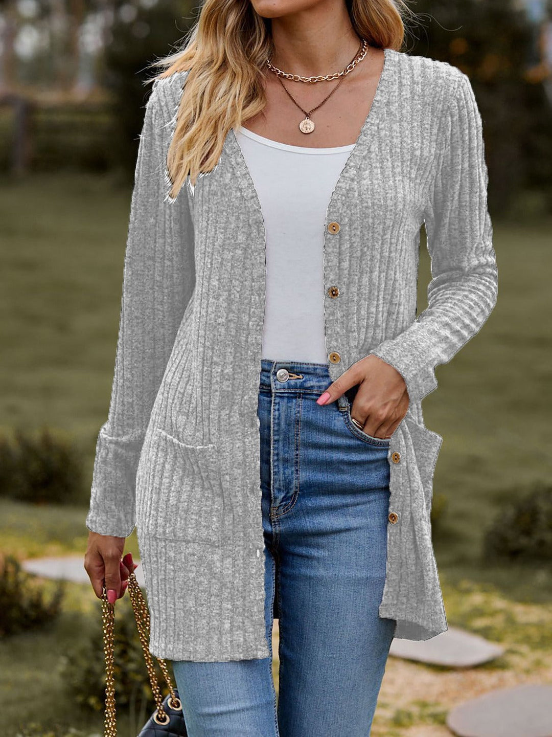Damen Strickjacke mit elegantem Rippenmuster und praktischen Taschen W&W Mode