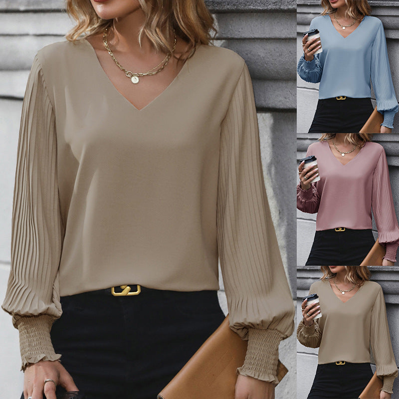 Damen Bluse mit voluminösen Plisseeärmeln und elegantem V-Ausschnitt WW