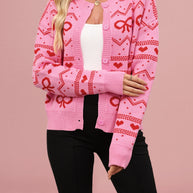Damen Strickjacke mit verspieltem Herz- und Schleifenmuster WW
