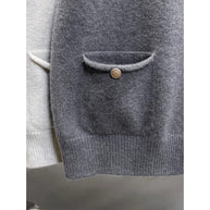 Damen Strickweste mit Knopfdetails und seitlichen Taschen WW