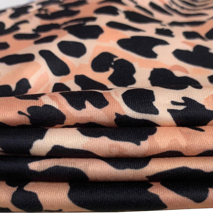 Damen Langarm Body mit aufregendem Leopardenmuster W&W Mode