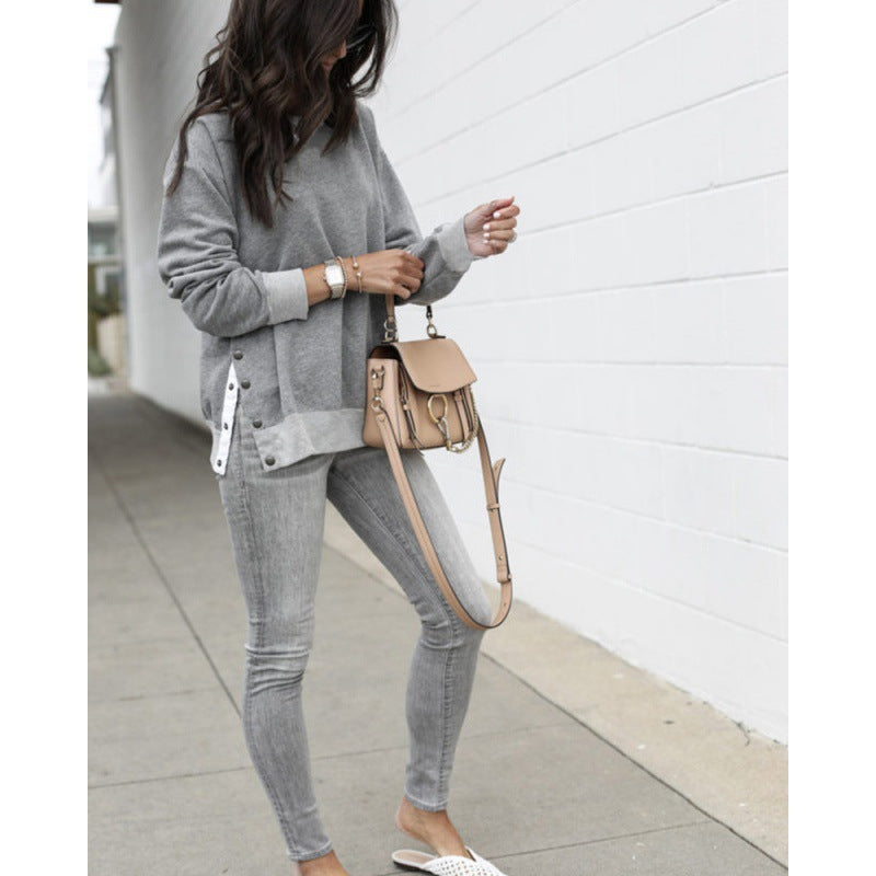 Damen Bequemer Sweatshirt mit Knopfdetails und seitlichen Schlitzen WW