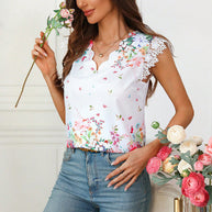 Damen Bluse mit floralem Design und elegantem Spitzenärmel WW