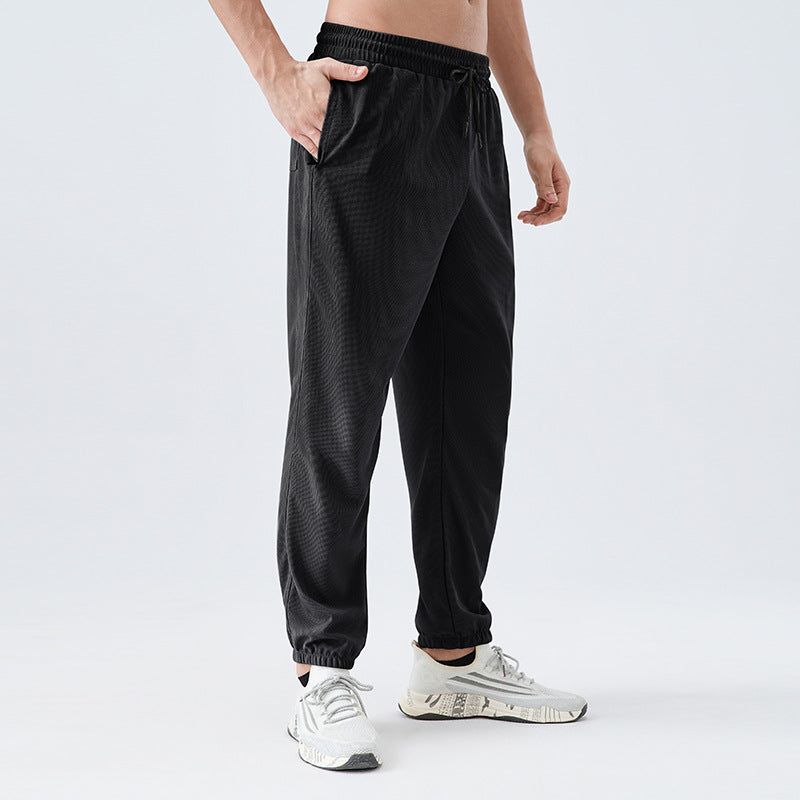 Herren Sportliche Laufhose mit atmungsaktiven Netzstrukturen und verstellbarem Bund WW