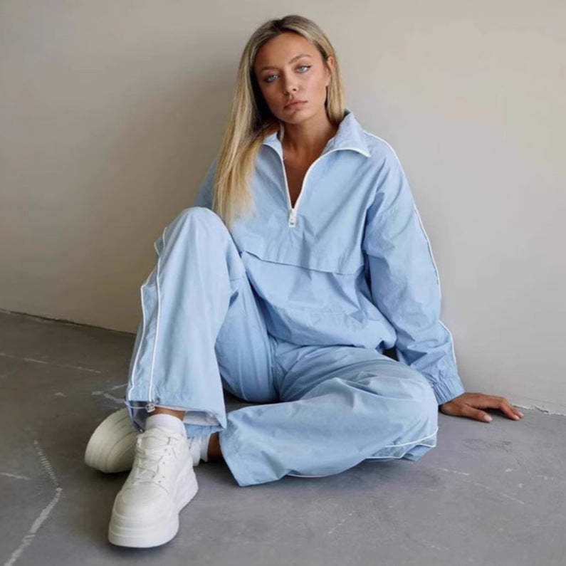 Damen sportliche Windjacke mit halbem Reißverschluss und elastischen Ärmeln WW