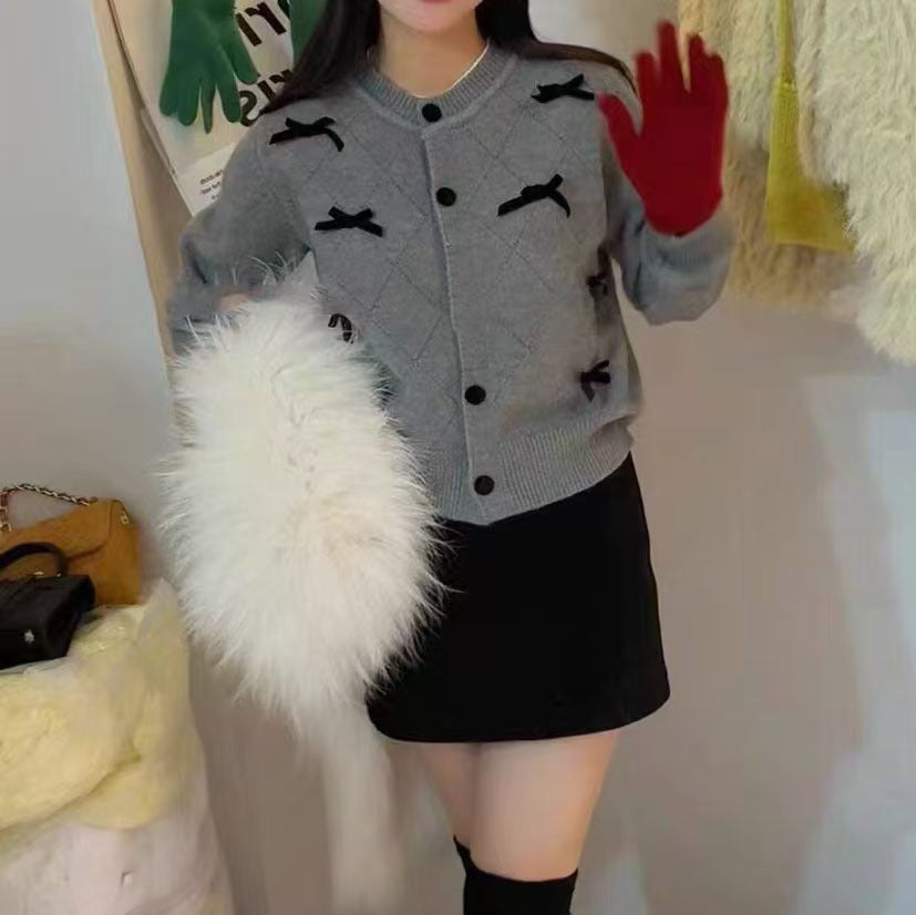 Damen Strickjacke mit dekorativen Schleifen WW