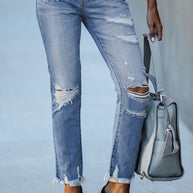 Damen Ripped High-Waist Jeans mit fransigem Saum und modischen Destroyed-Details WW