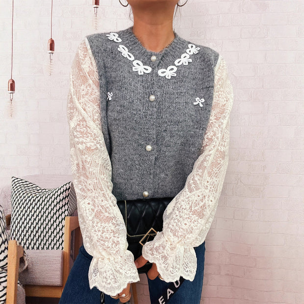 Damen Strickjacke mit romantischen Spitzendetails und eleganten Knopfverschlüssen WW