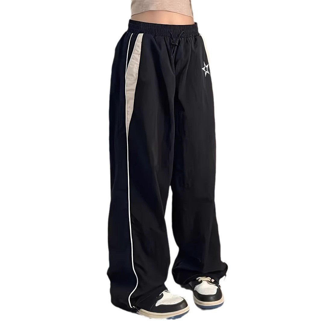 Damen Sportliche Weite Hose mit seitlichen Streifen und elastischem Bund W&W Mode