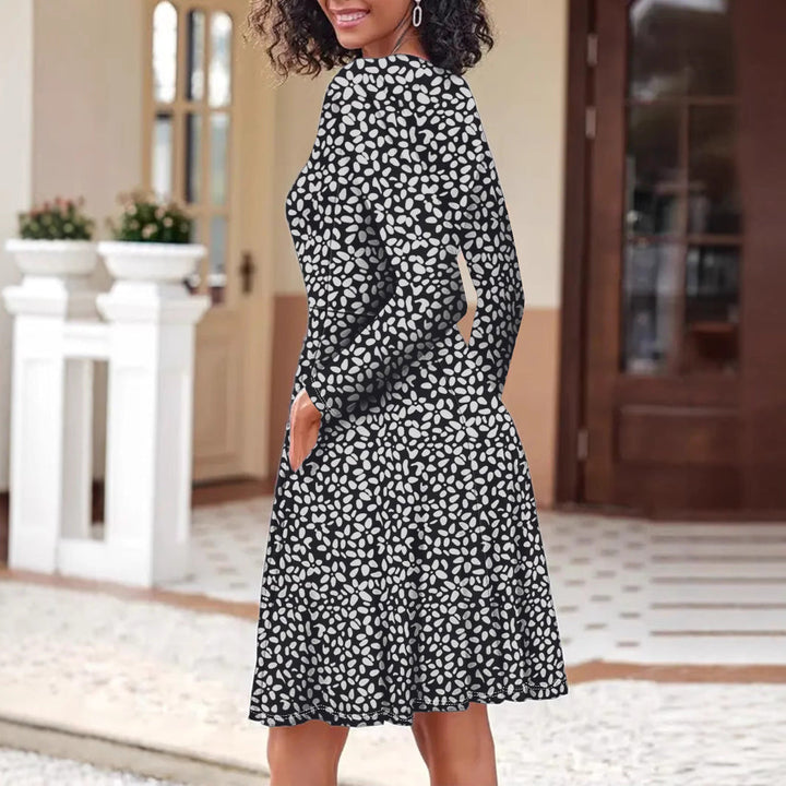 Damen Blusenkleid mit floralem Design und praktischen Taschen W&W Mode
