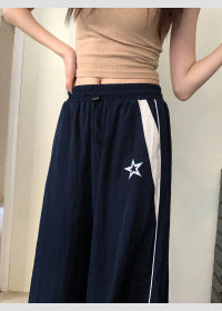 Damen Sportliche Weite Hose mit seitlichen Streifen und elastischem Bund W&W Mode