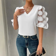 Damen Bluse mit transparenten Puffärmeln und eleganten Detail WW