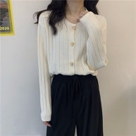 Damen Strickjacke mit dekorativem Knopfdesign und vertikalem Rippmuster WW