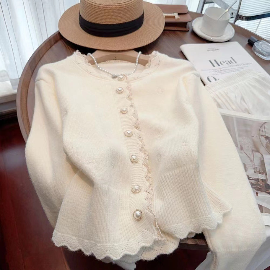 Damen Strickjacke mit dekorativen Perlenknöpfen und zarter Rippstruktur WW
