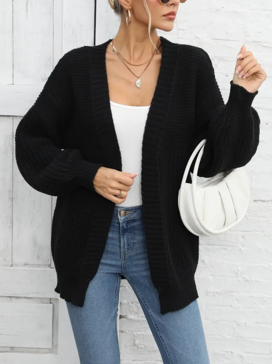 Damen Strickjacke mit oversize Schnitt und tiefem V-Ausschnitt WW