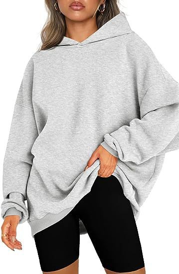 Damen oversized Kapuzenpullover mit seitlichen Schlitzen W&W Mode